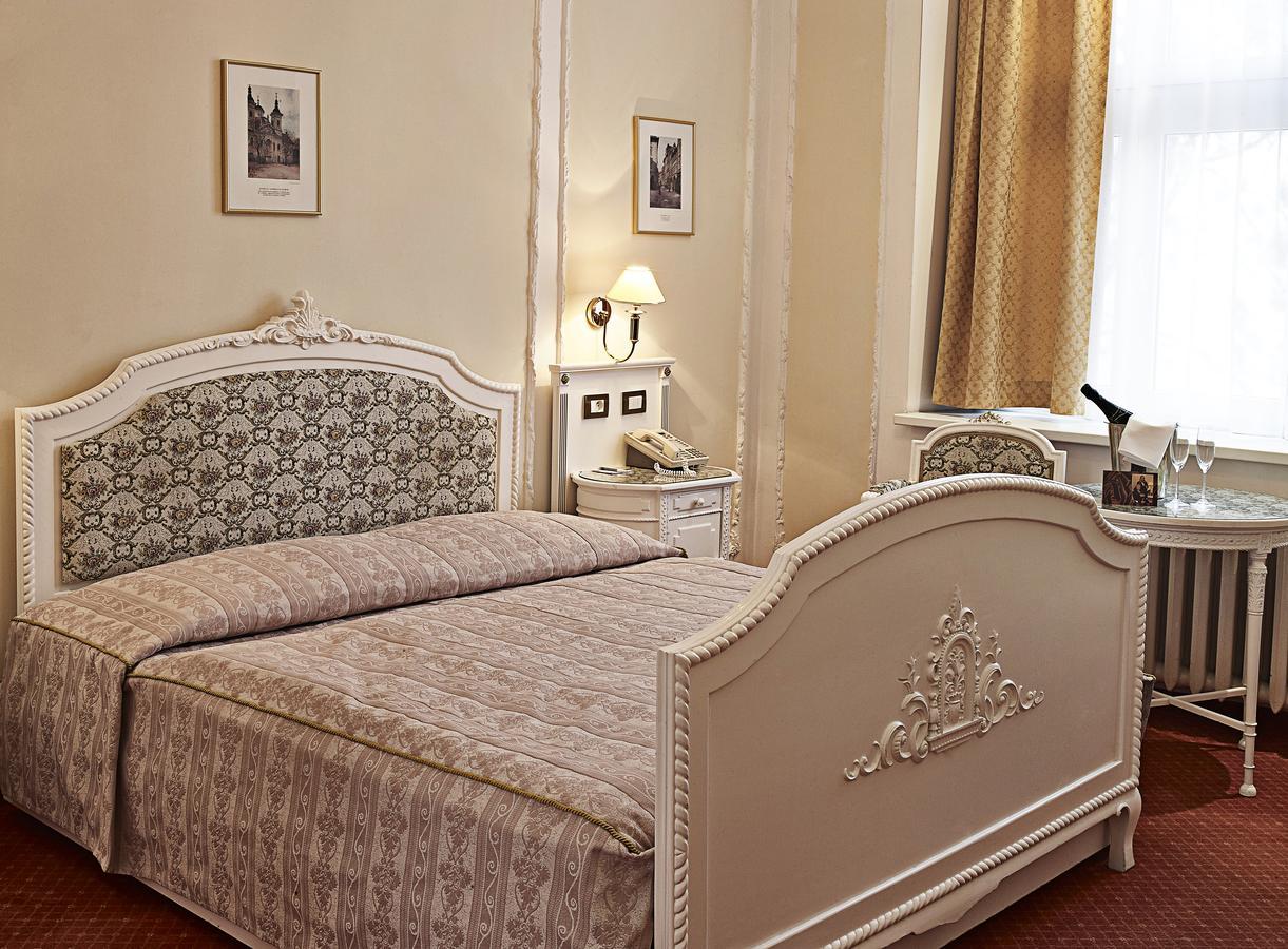 فندق أمباسادور زلاتا هوسا براغ المظهر الخارجي الصورة A bedroom